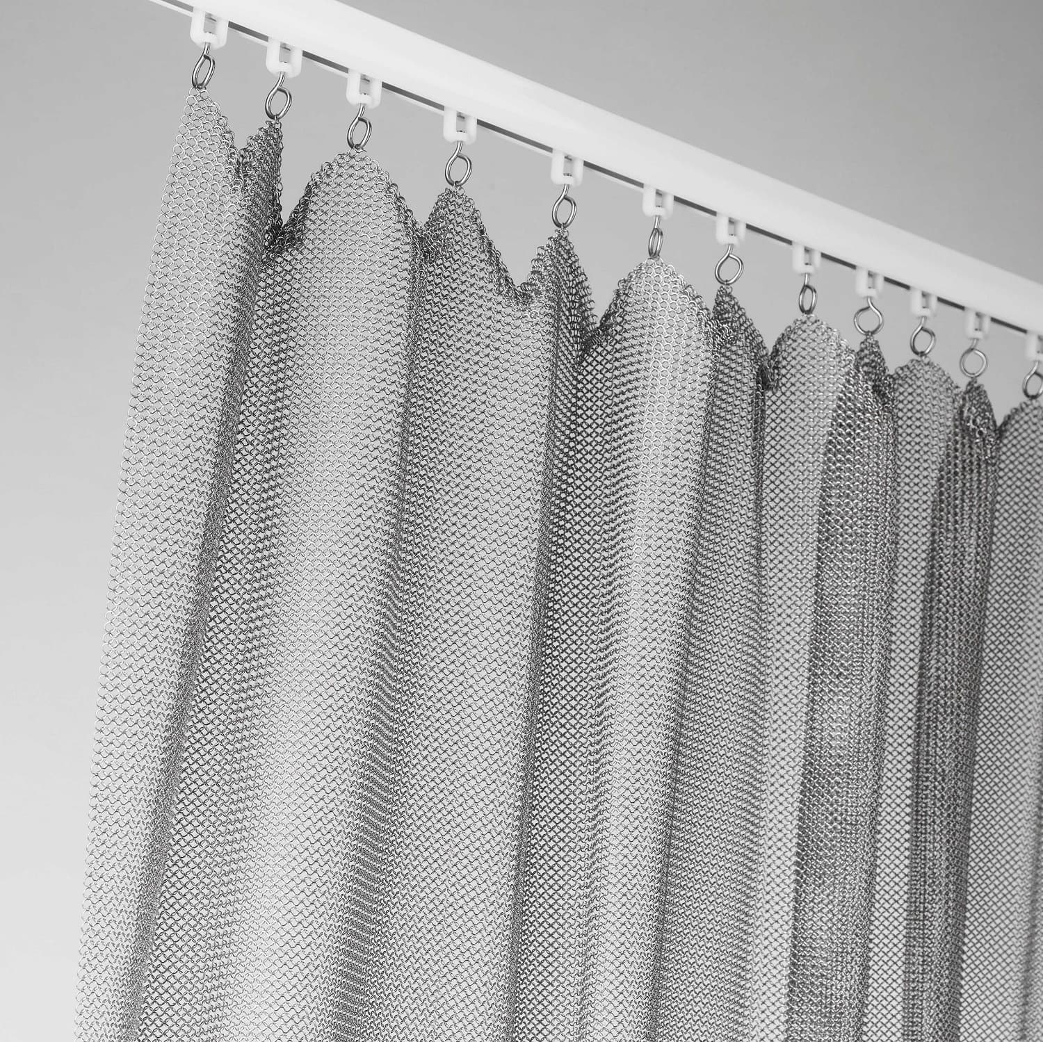 Glid/hjul  - för metalldraperi av ringar eller lättare draperier