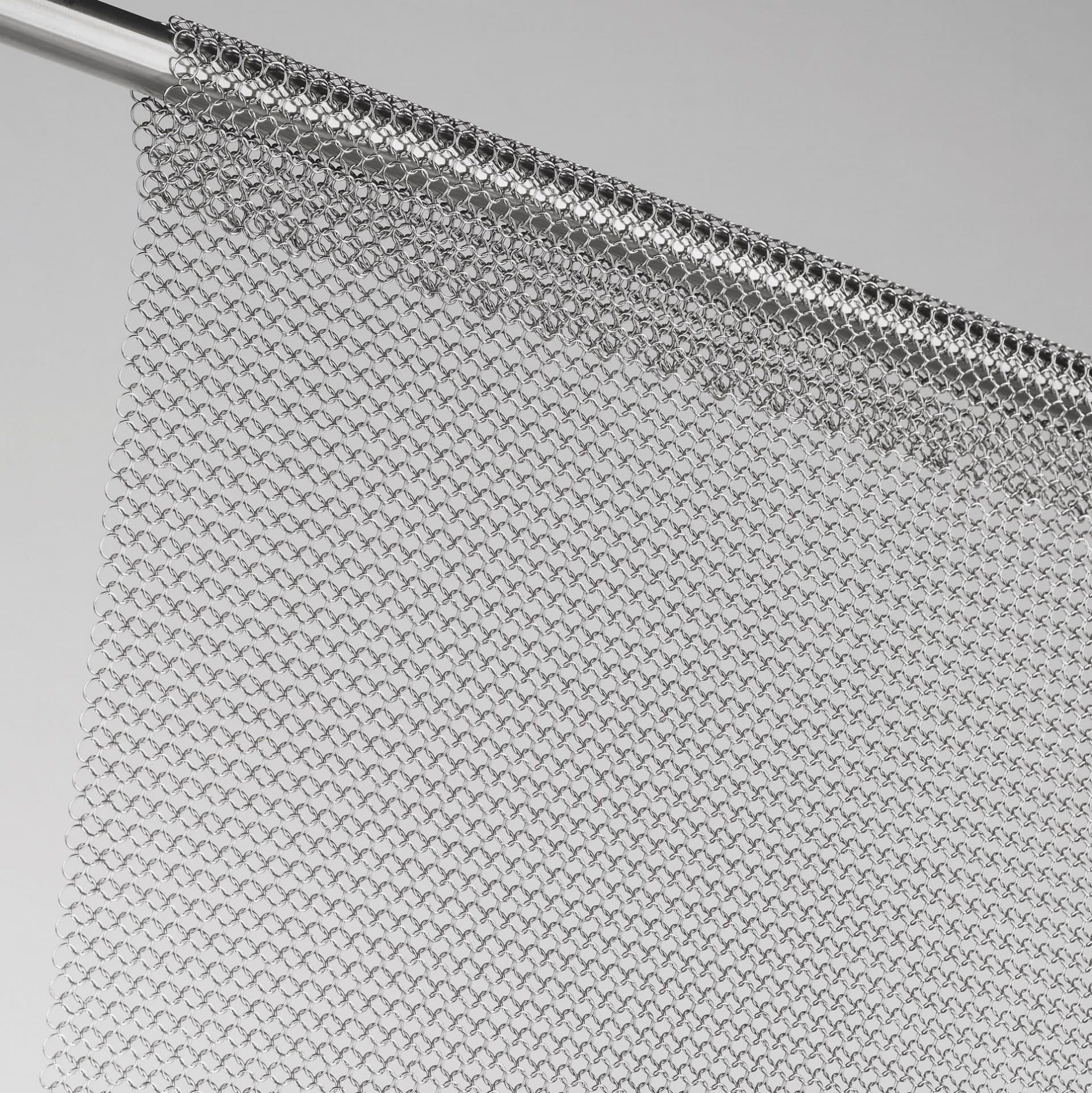 Panel curtain of welded rings, chainmail