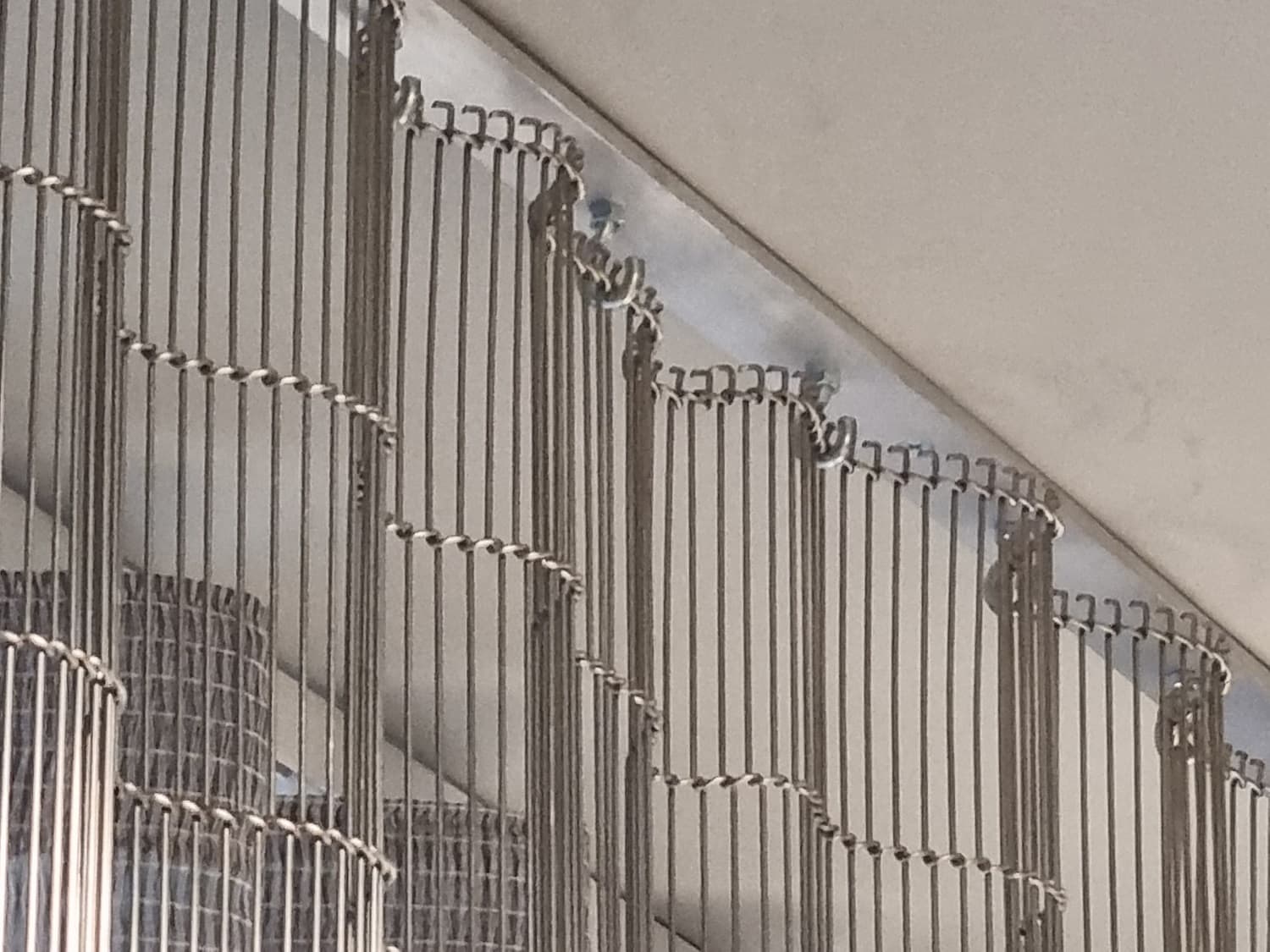 Ceiling rail with fixed hooks - for light to medium heavy metal draperies